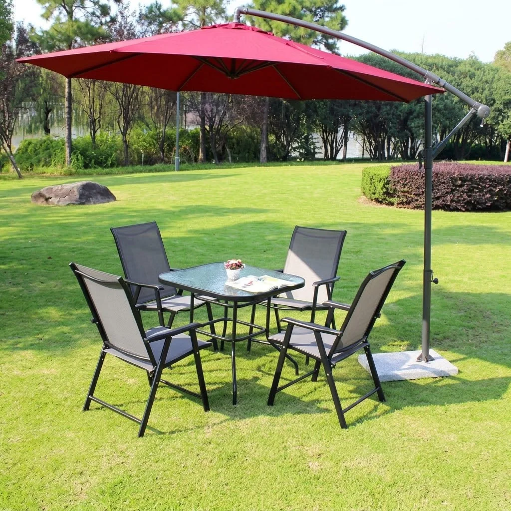 Outdoor patio set with a table and chairs on a wooden deck